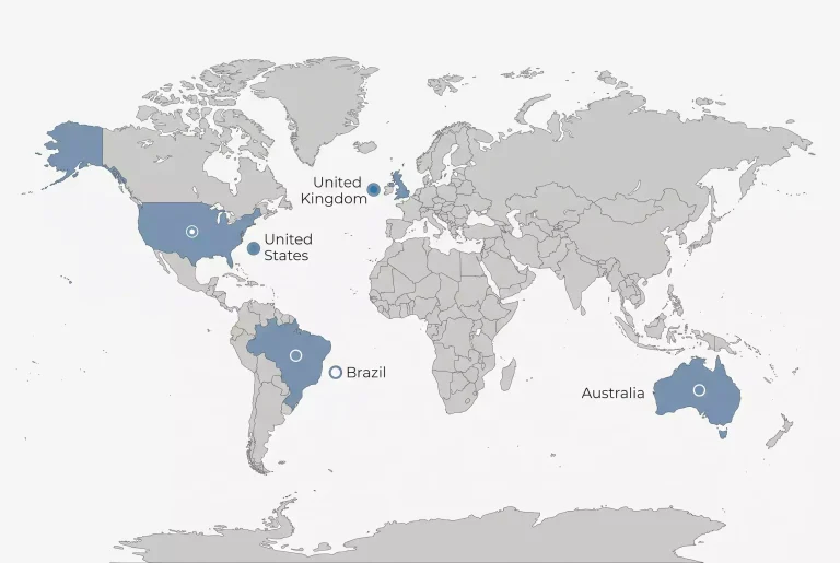 World map overlaid with credit card and ban status markers highlighting the UK, Australia and Brazil